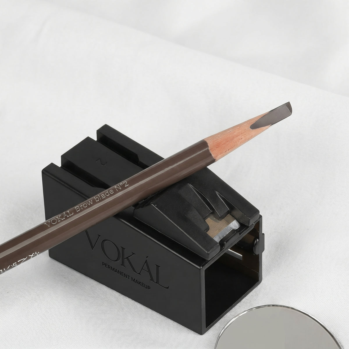 VOKAL sharpener shown with a brow pencil; pencil sold separately