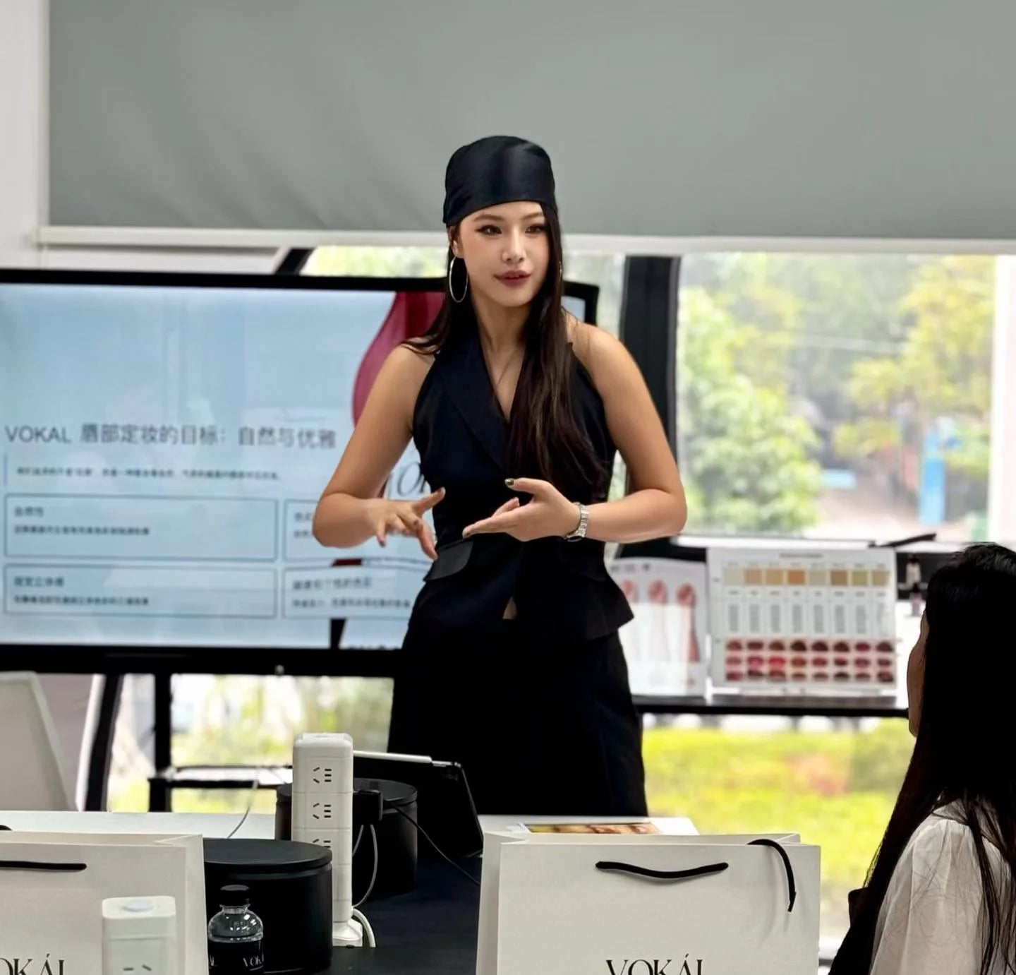 An instructor explaining lip theory in the VOKAL classroom